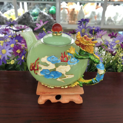 Bộ ấm trà chạm rồng với ly chạm hoa văn đá ngọc cẩm thạch xanh