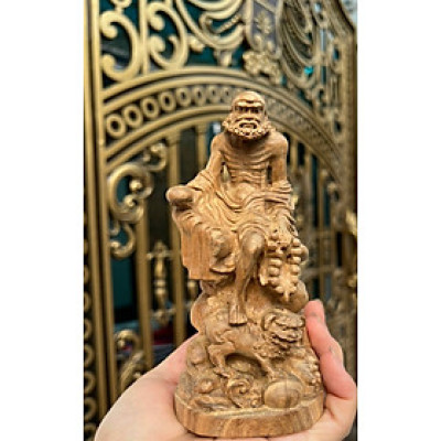 Tượng đạt ma sư tổ cưỡi lân ,bằng gỗ bách xanh kt cao 15×8×8cm