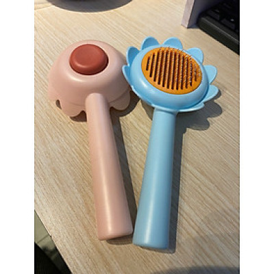 CÓ HỘP - Lược chải lông gỡ rối cho chó mèo hình hoa dướng dương có nút bấm đẩy lông thừa