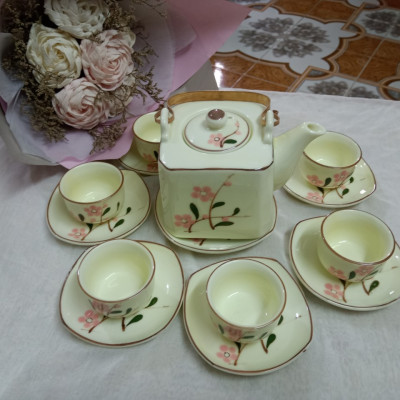 Bộ ấm chén men kem vẽ hoa đào đỏ gốm sứ Bát Tràng
