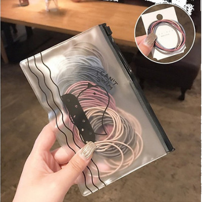 Sét 100 dây buộc  tóc mix nhiều mầu có túi đựng HD32