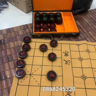Quân cờ gỗ trắc kt 4.5×1.5cm + cả hộp đựng 