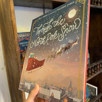 Sách - Through the North Pole Snow: A magical Christmas story by Polly Faber / English Children Book