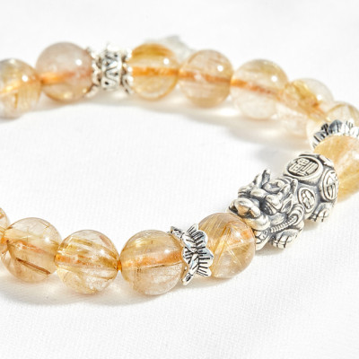 Vòng thạch anh tóc vàng phối chim én xuân Ngọc Quý Gemstones