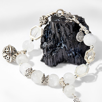 Vòng tay thạch anh ưu linh trắng mix lục lạc Ngọc Quý Gemstones