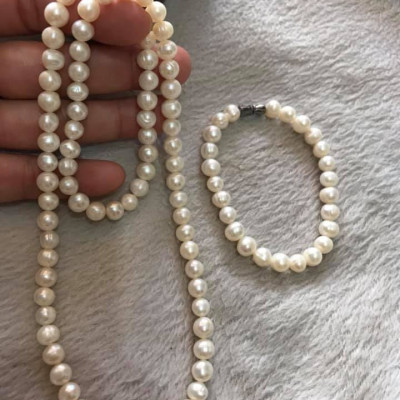 CẢ BỘ VÒNG TAY VÀ DÂY CHUỖI CHẤT LIỆU NGỌC TRAI  SIZE HƠN 7MM 