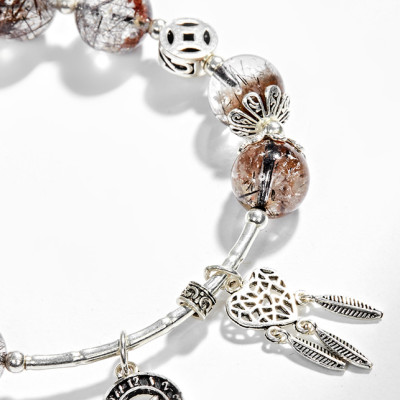 Vòng tay thạch anh ưu linh tóc đen phối charm dream catcher (8mm) Ngọc Quý Gemstones