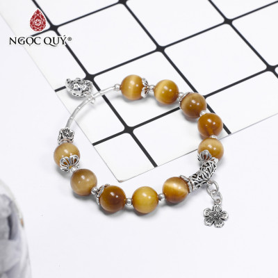 Vòng tay đá mắt hổ vàng tâm phối charm hoa bạc size hạt 10mm mệnh thổ , kim - Ngọc Quý Gemstones